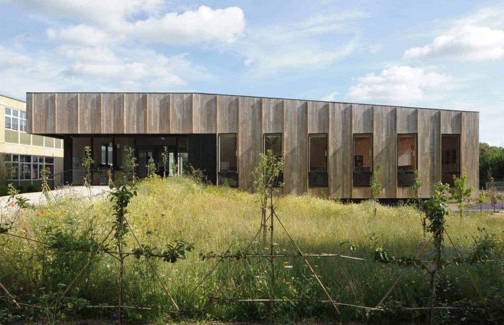 The Lee Centre – a cross-laminated timber hub for science learning at Ralph Allen School, blending natural materials with a flexible, university-style layout.