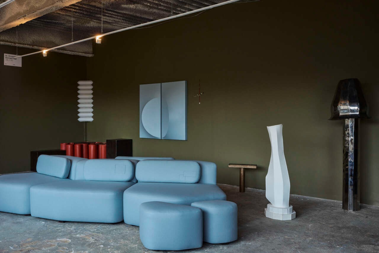 Photo of show room. Inside is various designer furniture pieces