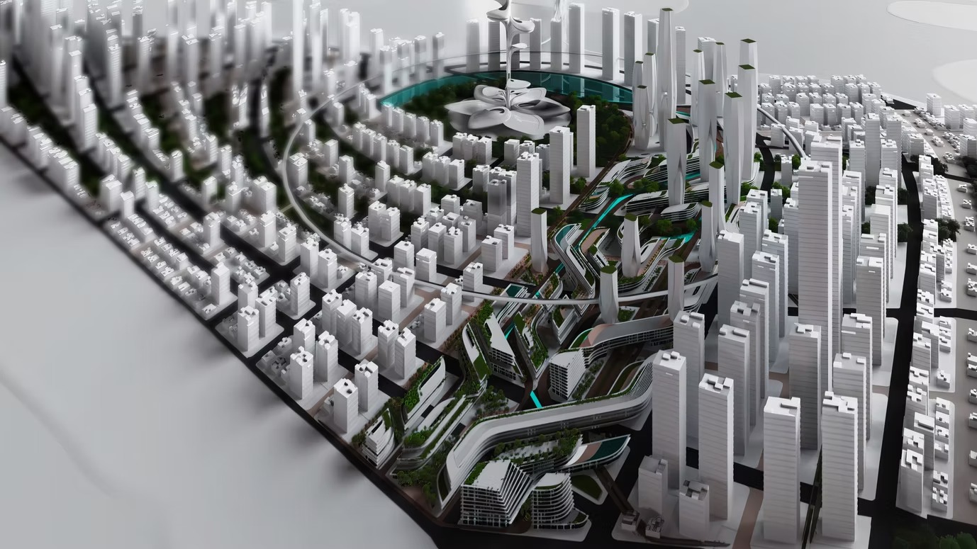 Digital 3D model of a futuristic city with dense high-rise clusters, layered green terraces, flowing infrastructure, and a central circular park featuring a sculptural tower and water feature.
