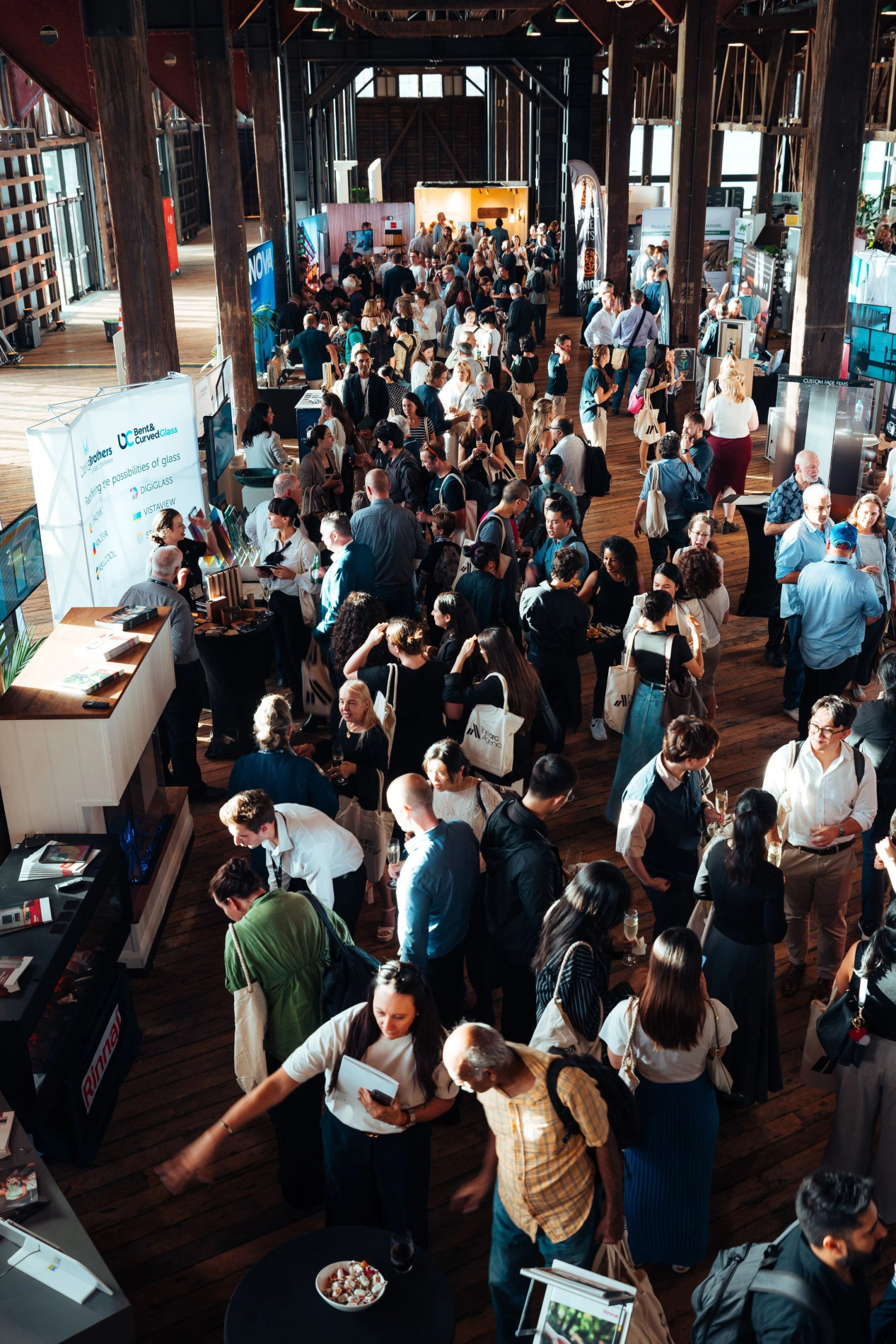 Photo of a crowd of people at the bar / networking