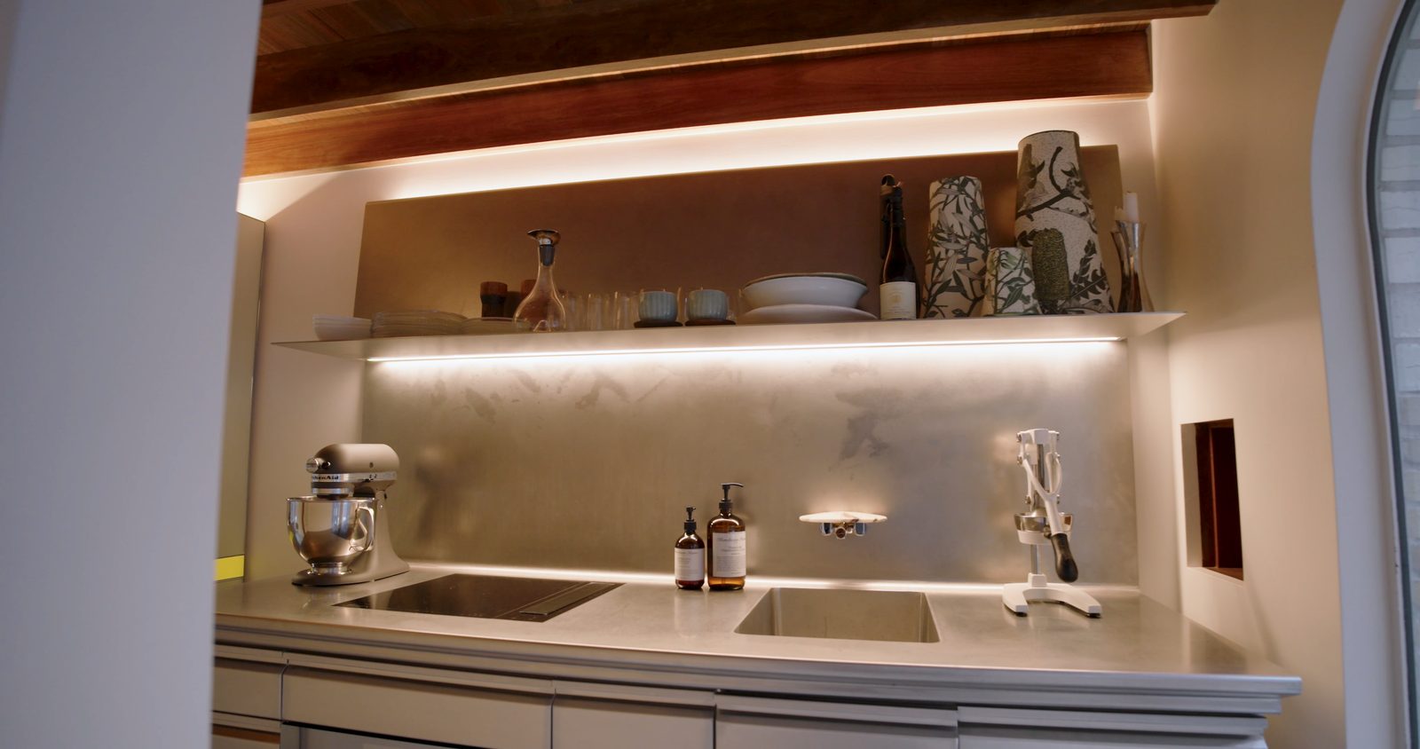 The kitchen bench and sink