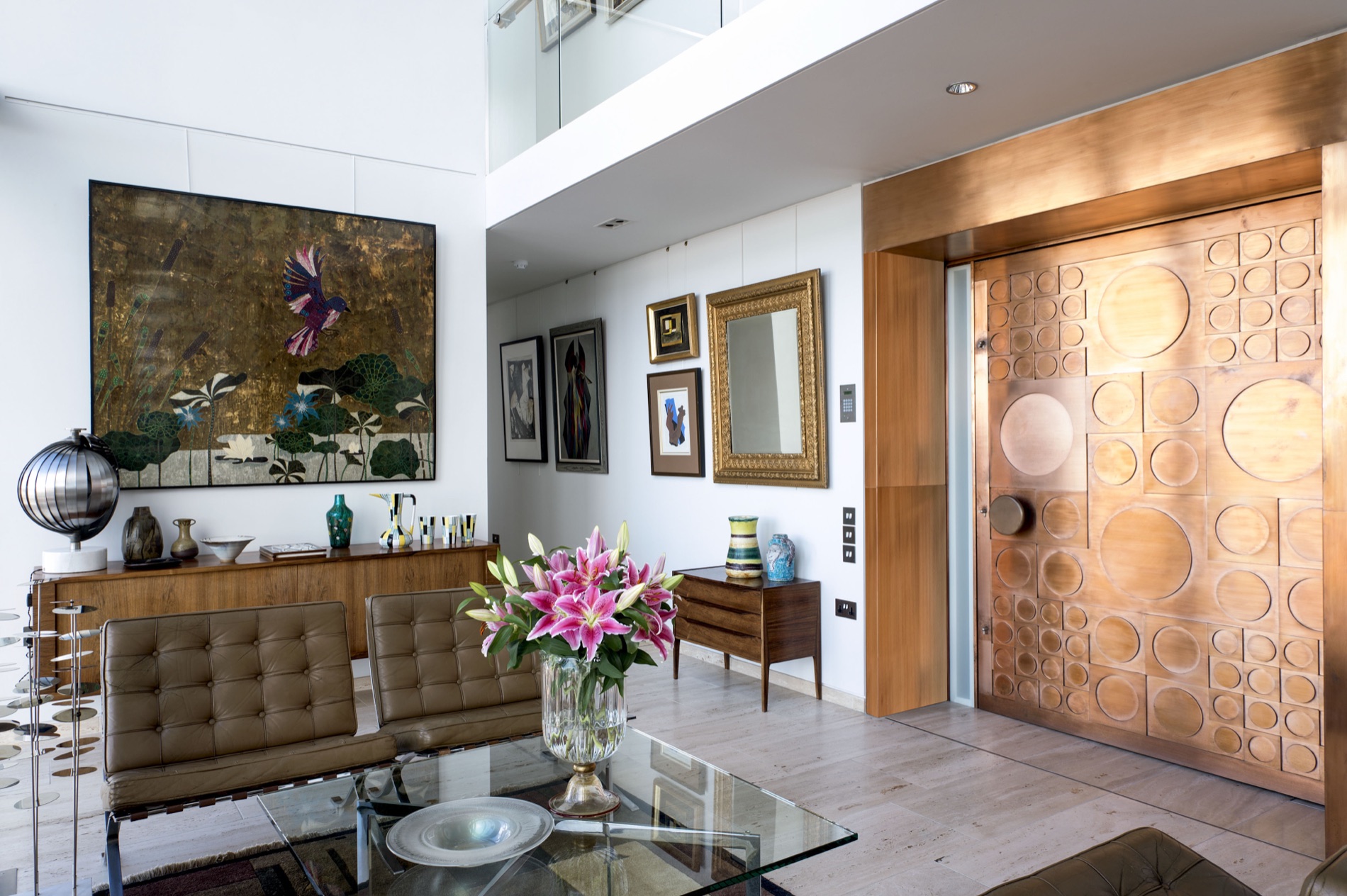 The entrance lobby with its carved veneer panel