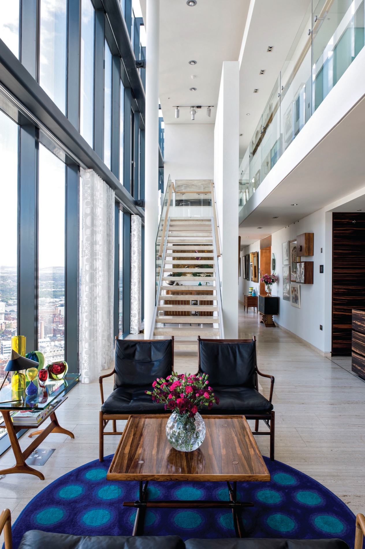The stair up to the bedrooms and studio