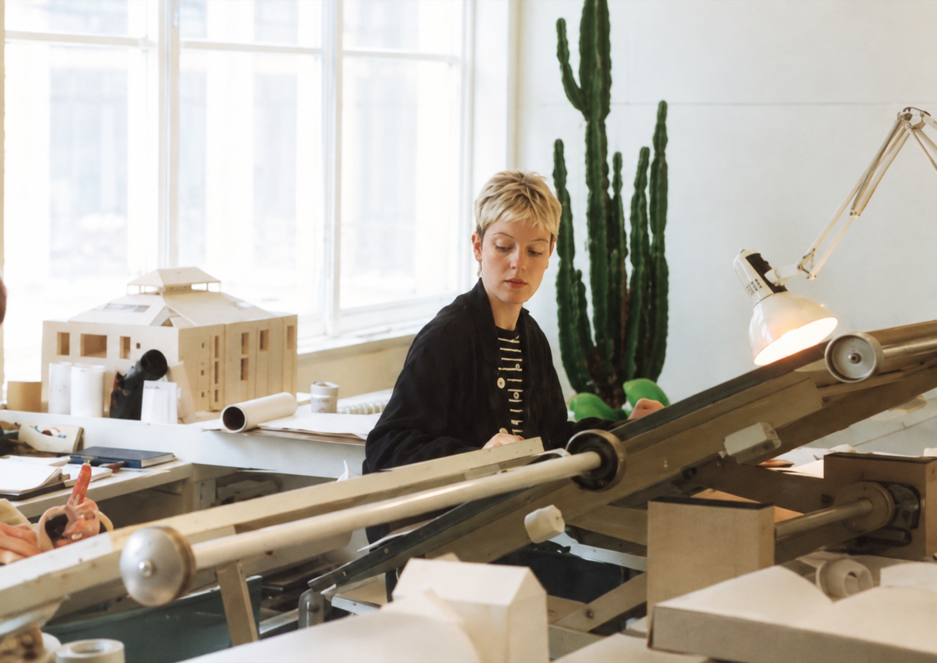 Rachel Haugh at the drawing board in the first studio