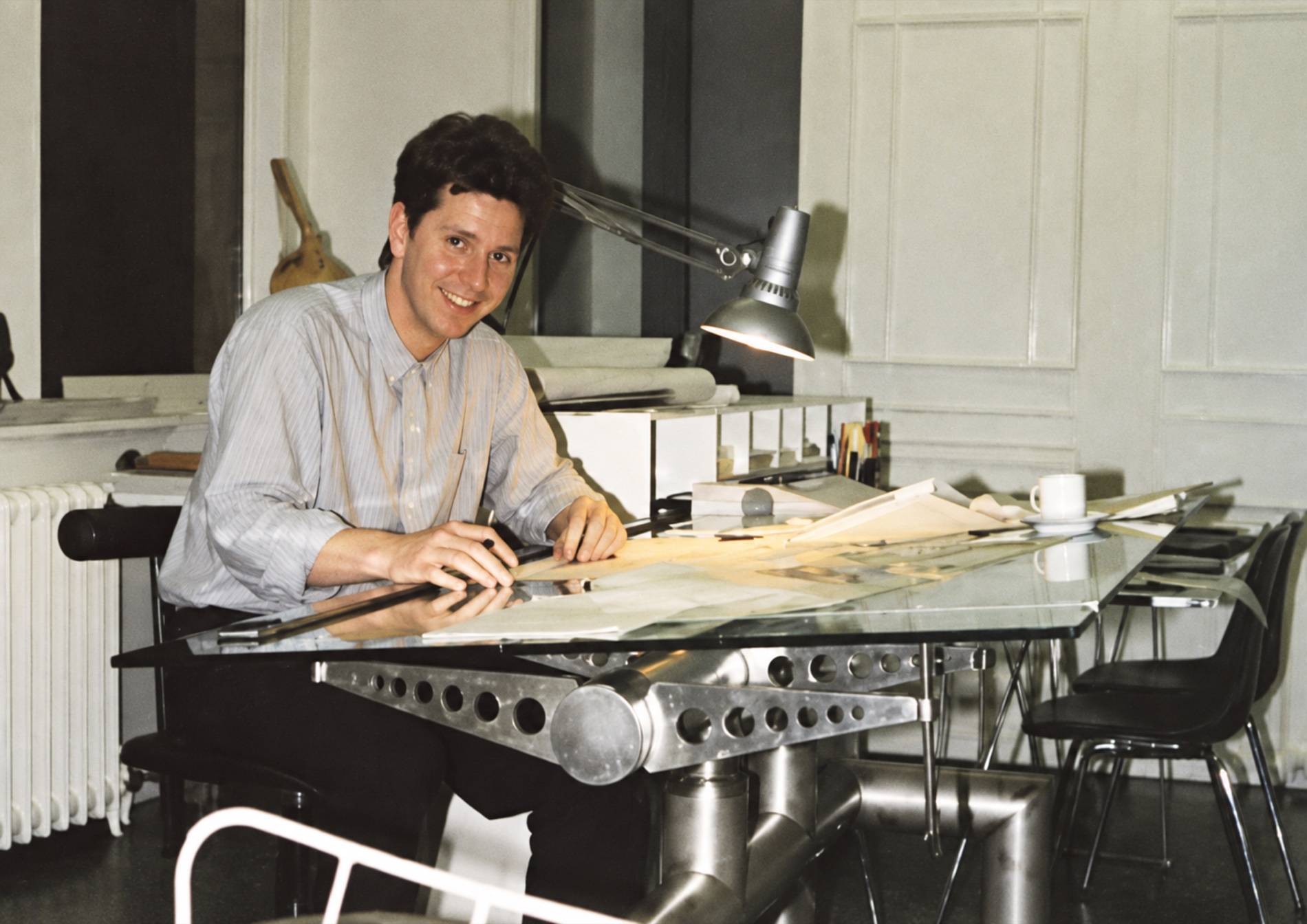 Ian Simpson at the drawing board in the first studio