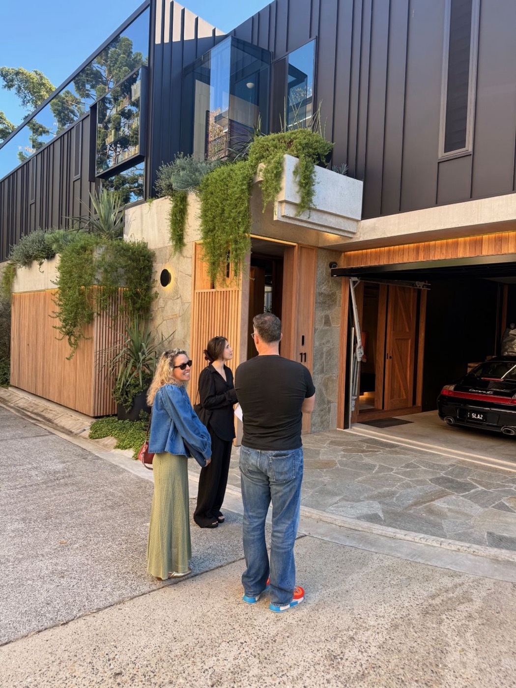 The Bespoke team on a Home to Office film shoot outside a house in Brisbane