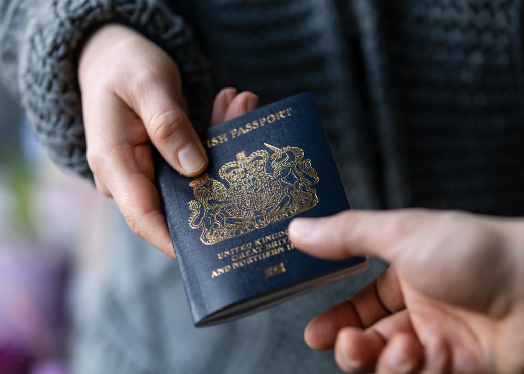 Handing Over UK Passport, Precise Consultants