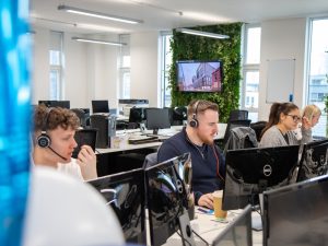 Reece and Jake working at desks